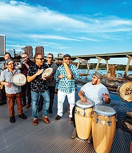 Kadencia, which performs Saturday at the Library of Virginia from noon to 4 p.m., plays bomba and Mayagüez-style plena music to promote and preserve Afro-Puerto Rican music. Kadencia is an 11-member band led by father-and-son duo Maurice Sanabria-Ortiz, third from right, and Maurice “Tito” Sanabria, fourth from right.