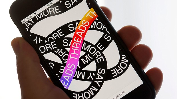 In this photo illustration, the home page of the social media application Threads is displayed on the screen of an iPhone on July 5.
Mandatory Credit:	Chesnot/Getty Images