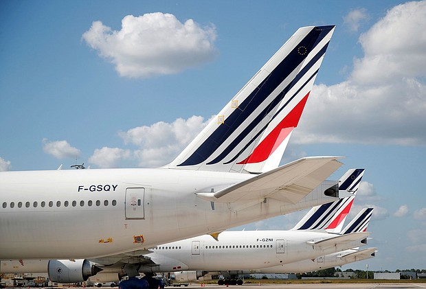 Air France Boeing 777 planes sit on the tarmac at Paris Charles de Gaulle airport in Roissy-en-France in France May 25, 2020.
Mandatory Credit:	Charles Platiau/Reuters