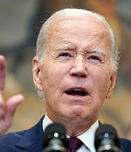 President Joe Biden speaks in the Roosevelt Room of the White House in Washington, DC, in June.
Mandatory Credit:	Evan Vucci/AP