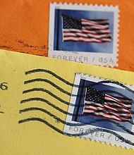 The USPS is seeking to raise the price of a first-class stamp from 63 cents to 66 cents, up 32 percent since 2019 when the price of a stamp was 50 cents. The price increase is set to take effect on July 9 pending approval by the postal regulator.
Mandatory Credit:	Justin Sullivan/Getty Images