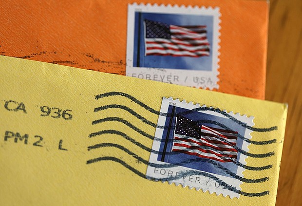 The USPS is seeking to raise the price of a first-class stamp from 63 cents to 66 cents, up 32 percent since 2019 when the price of a stamp was 50 cents. The price increase is set to take effect on July 9 pending approval by the postal regulator.
Mandatory Credit:	Justin Sullivan/Getty Images