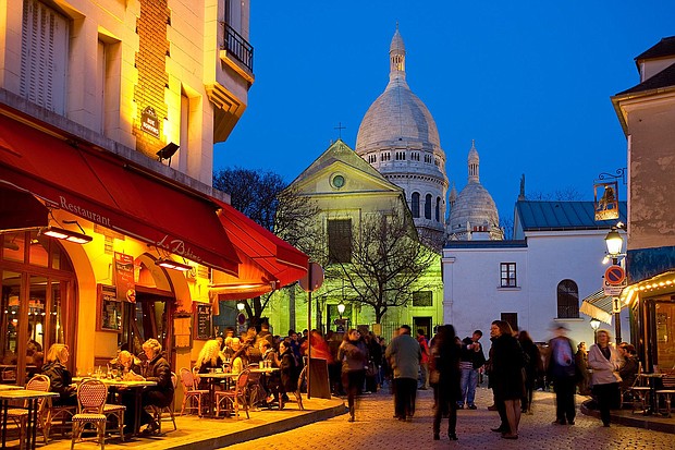 Who couldn't resist a glass of wine in the Montmartre area of Paris? Just make sure you're legal age first.
Mandatory Credit:	Sylvain Sonnet/The Image Bank RF/Getty Images
