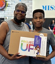 Cheryl Lewis and her son Jeremy learned online safety tips at the event.