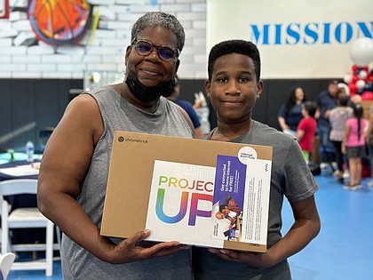 Cheryl Lewis and her son Jeremy learned online safety tips at the event.