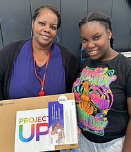 DeAnn Shodimu and her daughter Sade attended the Digital Literacy Night.
