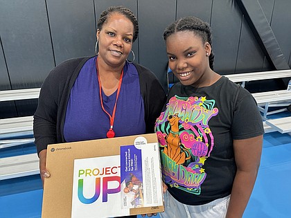 DeAnn Shodimu and her daughter Sade attended the Digital Literacy Night.