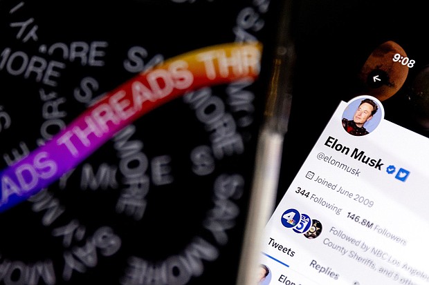 An illustration picture shows two mobile phones displaying the login page of the social media app 'Threads' (L) and the 'Twitter' account of Elon Musk in Los Angeles on June 6. The new messaging app launched by Mark Zuckerberg is a direct competitor to Musk's Twitter.
Mandatory Credit:	Etienne Laurent/EPA-EFE/Shutterstock