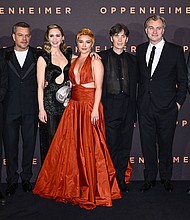 (From left) Kenneth Branagh, Rami Malek, Matt Damon, Emily Blunt, Florence Pugh, Cillian Murphy, Christopher Nolan, Robert Downey Jr. and Josh Hartnett at the London premiere of 'Oppenheimer' on July 13.
Mandatory Credit:	Gareth Cattermole/Getty Images