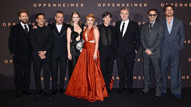 (From left) Kenneth Branagh, Rami Malek, Matt Damon, Emily Blunt, Florence Pugh, Cillian Murphy, Christopher Nolan, Robert Downey Jr. and Josh Hartnett at the London premiere of 'Oppenheimer' on July 13.
Mandatory Credit:	Gareth Cattermole/Getty Images