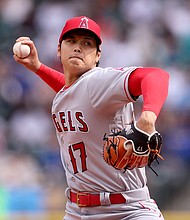 Shohei Ohtani pitches during the first inning against the Seattle Mariners.
Mandatory Credit:	Steph Chambers/Getty Images