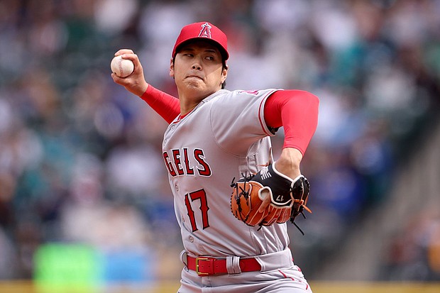Shohei Ohtani pitches during the first inning against the Seattle Mariners.
Mandatory Credit:	Steph Chambers/Getty Images