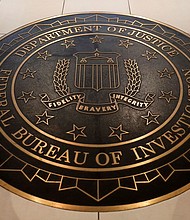 The Federal Bureau of Investigation seal is seen at FBI headquarters in Washington, DC.
Mandatory Credit:	Yuri Gripas/Reuters