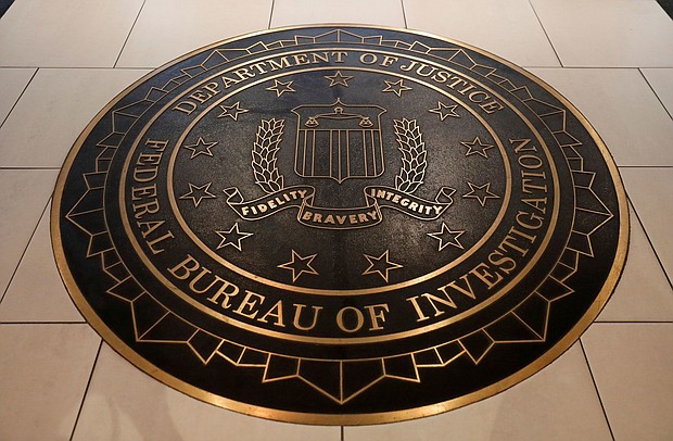 The Federal Bureau of Investigation seal is seen at FBI headquarters in Washington, DC.
Mandatory Credit:	Yuri Gripas/Reuters