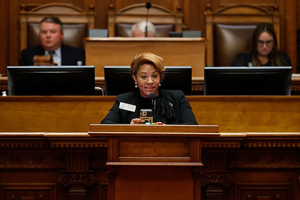 Georgia state Rep. Mesha Mainor center, speaks in the House Chamber at the Georgia Capitol, March 6, in Atlanta. Mainor announced on July 11 that she was switching from the Democratic Party to the Republican Party, saying Democrats had driven her out for refusing to follow party orthodoxy.
Mandatory Credit:	Alex Slitz/AP