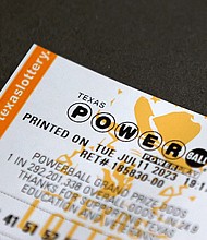 A Powerball lottery ticket seen Wednesday in Houston.
Mandatory Credit:	Aaron M. Sprecher/AP