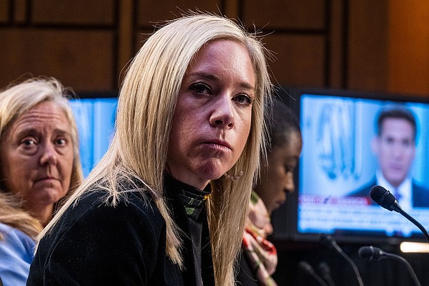 Amanda Zurawski of Austin, Texas, center, is the lead plaintiff in the lawsuit.
Mandatory Credit:	Tom Williams/CQ Roll Call/AP