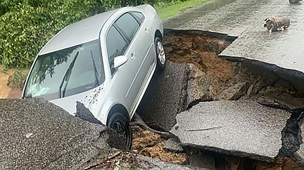 This road in Graves County, Kentucky, was washed out by flooding on July 19, the sheriff's office said.
Mandatory Credit:	Graves County Sheriff's Office