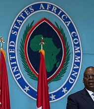 Secretary of Defense Lloyd J. Austin III delivers remarks at the US Africa Command Change of Command Ceremony at Kelley Barracks, US Army Garrison in Stuttgart, Germany in August 2022.
Mandatory Credit:	Staff Sgt. Julian Kemper/Office of the Secretary of Defense/File