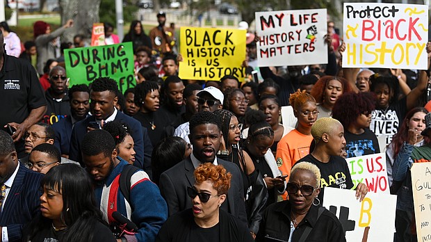 Demonstrators protest Florida Gov. Ron DeSantis' plan to eliminate Advanced Placement courses on African American studies in high schools as they stand outside the Florida State Capitol in Tallahassee on February 15.
Mandatory Credit:	Joshua Lott/The Washington Post/Getty Images