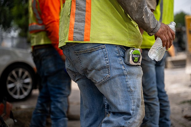 Construction workers gather together in the shade on July 11, in Austin, Texas. Record-breaking temperatures continue soaring as prolonged heatwaves sweep across the country's southwest.
Mandatory Credit:	Brandon Bell/Getty Images