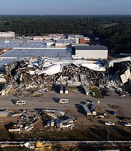 An aerial view shows a Pfizer facility in Rocky Mount, North Carolina, after a tornado. Most of the damage from July 19's tornado to a major Pfizer plant in North Carolina was to a warehouse facility, rather than areas that produce medicines, the drug giant said Friday.
Mandatory Credit:	Sean Rayford/Getty Images