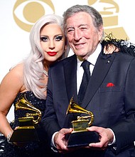 Lady Gaga and Tony Bennett pose with their Grammys for their 2014 album "Cheek to Cheek."
Mandatory Credit:	Frazer Harrison/Getty Images