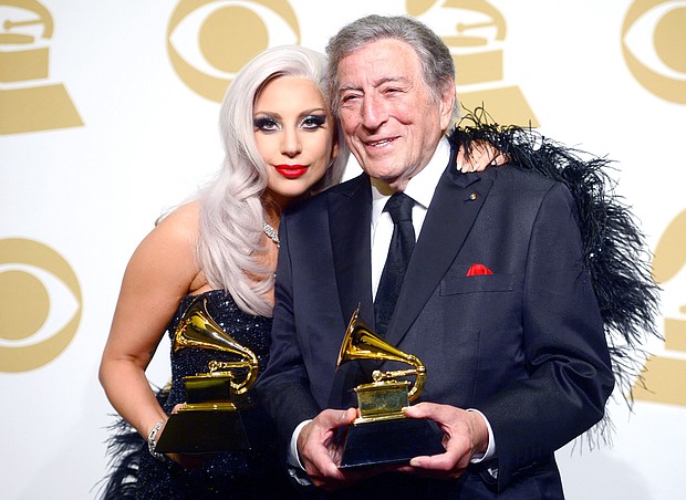 Lady Gaga and Tony Bennett pose with their Grammys for their 2014 album "Cheek to Cheek."
Mandatory Credit:	Frazer Harrison/Getty Images