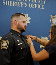 Lt. Rollins was pinned by his wife Tabitha Rollins.