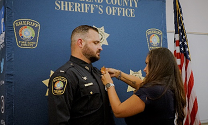 Lt. Rollins was pinned by his wife Tabitha Rollins.
