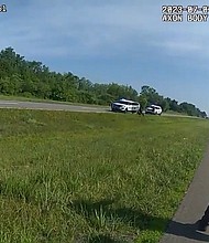 Video released by authorities captured the moments Jadarrius Rose, an unarmed Black man, was attacked by a police dog after a traffic stop.
Mandatory Credit:	Ohio State Highway Patrol