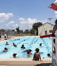 Many cities have struggled to hire lifeguards, leading to pool closures.
Mandatory Credit:	Hannah Beier/Reuters