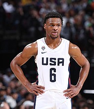 Bronny James, the son of NBA star LeBron James, looks on during the 2023 Nike Hoop Summit on April 8, at the Moda Center Arena in Portland, Oregon.
Mandatory Credit:	Sam Forencich/NBAE/Getty Images