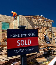 Pictured is a "Sold" sign outside a house under construction at Folsom housing community in Folsom, California, last month.
Mandatory Credit:	David Paul Morris/Bloomberg/Getty Images