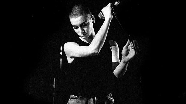 Irish singer Sinead O'Connor, here performing in Amsterdam in 1988, is dead at 56.
Mandatory Credit:	Paul Bergen/Redferns/Getty Images