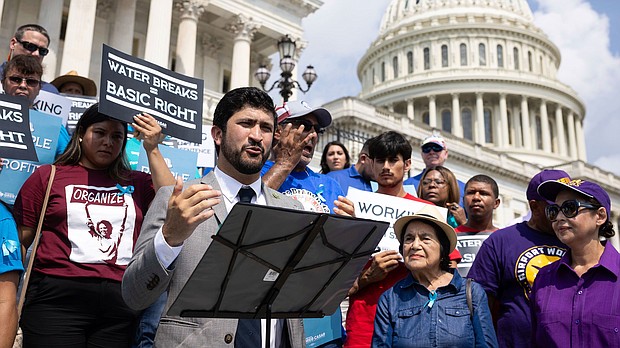 Rep. Greg Casar rallies with advocates as part of his hunger and thirst strike to call for workers' rights to heat protections outside the US Capitol on July 25.
Mandatory Credit:	Francis Chung/Politico/AP