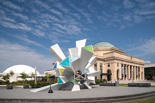 A giant kaleidoscopes sculpture “Cosmic Perception,” now stands outside of the Science Museum of Virginia. The work is designed by RE:site a public art studio. The sculpture as well as a community greenspace (The Green) opened in May.