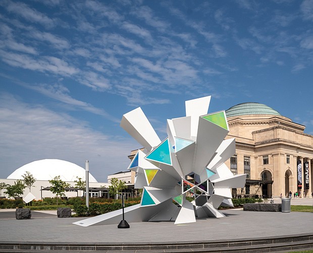 A giant kaleidoscopes sculpture “Cosmic Perception,” now stands outside of the Science Museum of Virginia. The work is designed by RE:site a public art studio. The sculpture as well as a community greenspace (The Green) opened in May.
