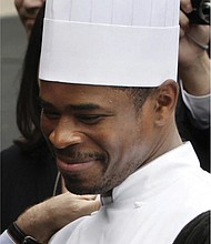White House Chef Tafari Campbell smiles in November 2008, on the South Lawn of the White House.