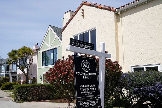 A Sale Pending sign hangs in front of a property in San Francisco, Tuesday, April 18.
Mandatory Credit:	Jeff Chiu/AP