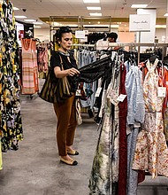 A customer during the grand re-opening of a Century 21 department store in New York, on Tuesday, May 16.
Mandatory Credit:	Stephanie Keith/Bloomberg/Getty Images