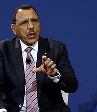 Niger's President Mohamed Bazoum, pictured on December 13, 2022, was reportedly seized by members of the presidential guard on Wednesday.
Mandatory Credit:	Evelyn Hockstein/Pool/Reuters