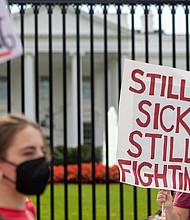 Protestors march outside the White House on September 19, 2022 to call attention to those suffering from long Covid-19. Up to 23 million people in the US could have long Covid, according to estimates.
Mandatory Credit:	Nathan Posner/Anadolu Agency/Getty Images
