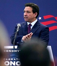 Republican presidential candidate Florida Gov. Ron DeSantis gestures during a campaign event, Monday, July 31, 2023, in Rochester, N.H.
Mandatory Credit:	Charles Krupa/AP