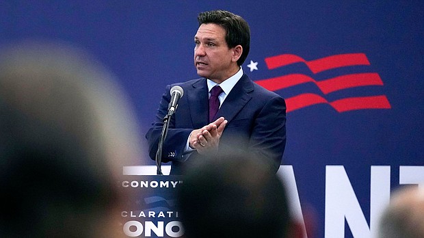 Republican presidential candidate Florida Gov. Ron DeSantis gestures during a campaign event, Monday, July 31, 2023, in Rochester, N.H.
Mandatory Credit:	Charles Krupa/AP