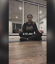 A screenshot from one of Veronique Davidson's "5 to 9 before the 9 to 5" TikToks shows her meditating early in the morning.
Mandatory Credit:	Courtesy Vero Simonee