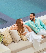 Chrissy Teigen and John Legend poolside at their new Beverly Hills property.
Mandatory Credit:	Yoshihiro Makino/Architectural Digest