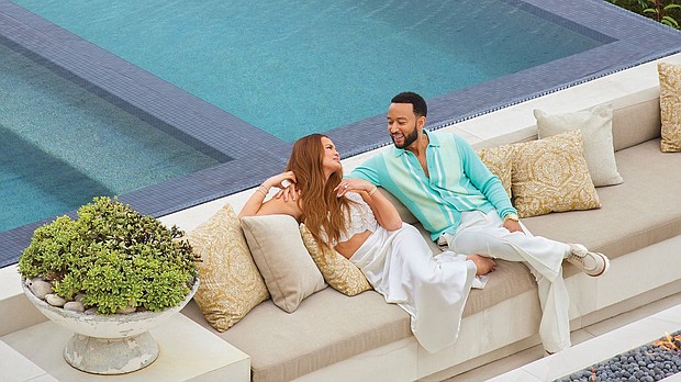 Chrissy Teigen and John Legend poolside at their new Beverly Hills property.
Mandatory Credit:	Yoshihiro Makino/Architectural Digest