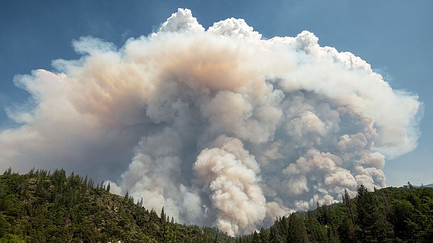 A large pyrocumulus cloud explodes outward on July 27, 2018, during the Carr Fire near Redding, California.
Mandatory Credit:	Josh Edelson/AFP via Getty Images