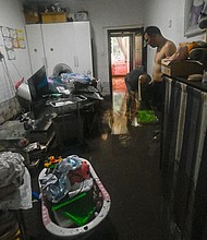 More than 52,000 people had to be evacuated from Beijing's Mentougou district as flood waters gushed into homes.
Mandatory Credit:	Pedro Pardo/AFP/Getty Images